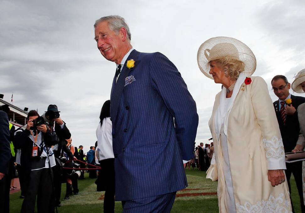 Prince Charles, Prince of Wales and Camilla, Duchess of Cornwall walk through the mounting yard during the 2012 Melbourne Cup Day at Flemington Racecourse in Melbourne, Australia.