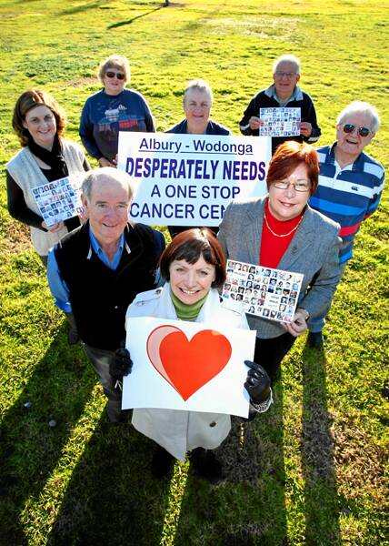 Cancer rally: Jenny Black, Clive Faul, Marianne Warren, Jodie Hart, Mel McIntyre, Eric Turner and Jan and Charlie Leaney. Picture: MATTHEW SMITHWICK