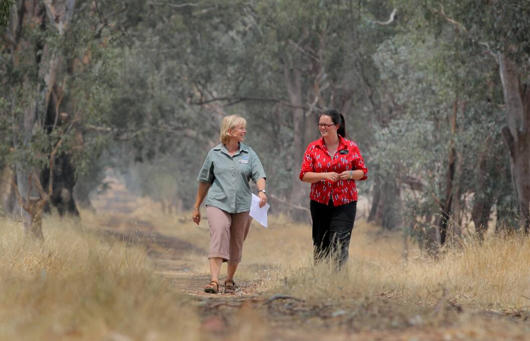 DEPI’s senior biodiversity officer Marike Van Nouhuys and Wodonga Council natural resources officer Claire Coulson welcome an agreement that protects land in Baranduda and Leneva. Picture: DAVID THORPE