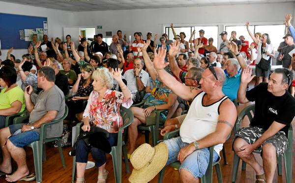The crowd at the unveiling of the Bellbridge master plan gave a conditional tick of approval via a show of hands. Pictures: BEN EYLES