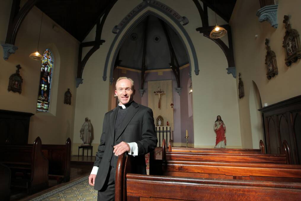 Father Joel Wallace surveys the newly renovated Sacred Heart Chapel. Picture: DAVID THORPE