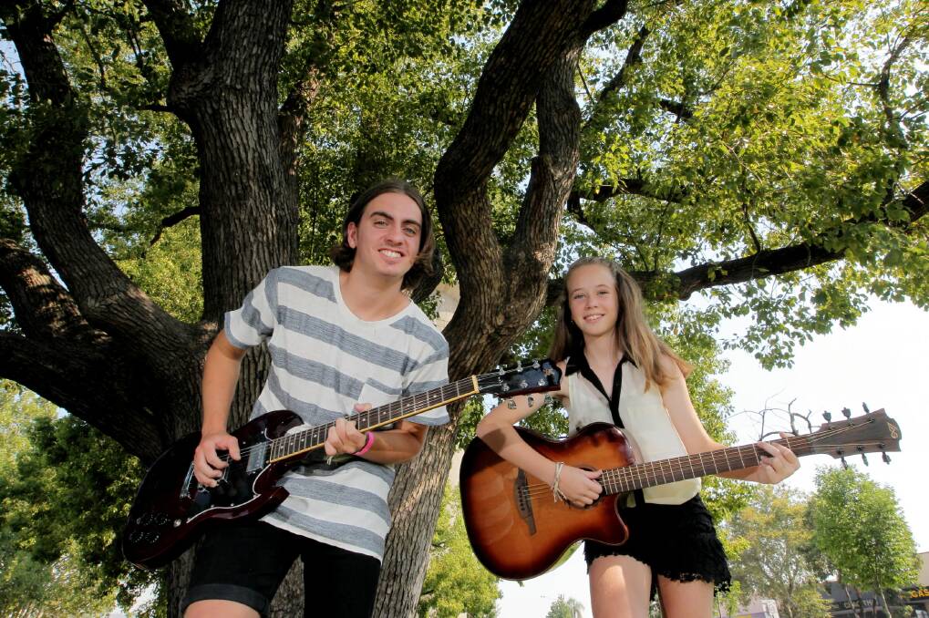 MEGAS Music Store students James Robinson, 17, and Kayla Smith, 11, will perform at Music in the Park at Woodland Grove on Friday night. Picture: David Thorpe