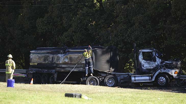 The charred wreckage of the petrol tanker on Mona Vale Road. Photo: Kate Geraghty