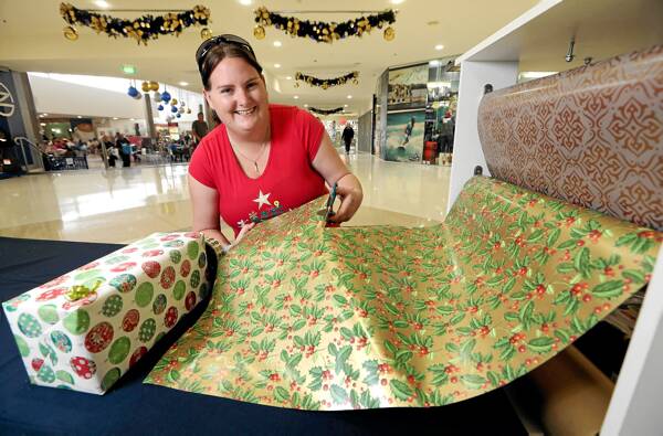 MS Gift Wrap volunteer Alicia Brookes is hoping that more people will join her this year for a good cause. Picture: KYLIE ESLER