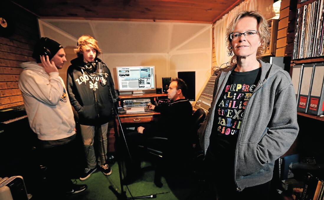 Heidi McAlpine, Matthew Daily, Jacob Brizzi and Adam Boon work on recording a song for their Suicide Watch music project. Picture: JOHN RUSSELL