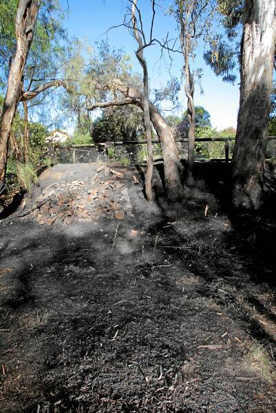Burnt out areas from a fire that threatened homes. Picture: TARA GOONAN
