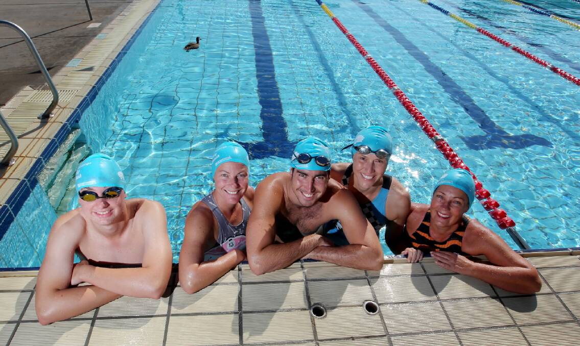 ABOVE: Liam Richardson, Kristy Hogan, Matt O’Connell, Sue Mills and Annette Baker are ready to race in tonight’s Big Splash at Albury Swim Centre. Picture: DAVID THORPE
