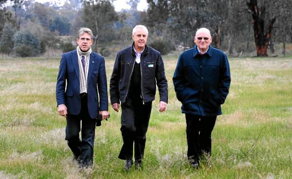Allan Curtis, Brian Hillas and Kalparrin board secretary Bruce Gilding inspect the Thurgoona “farm park” site yesterday. Picture: RAY HUNT