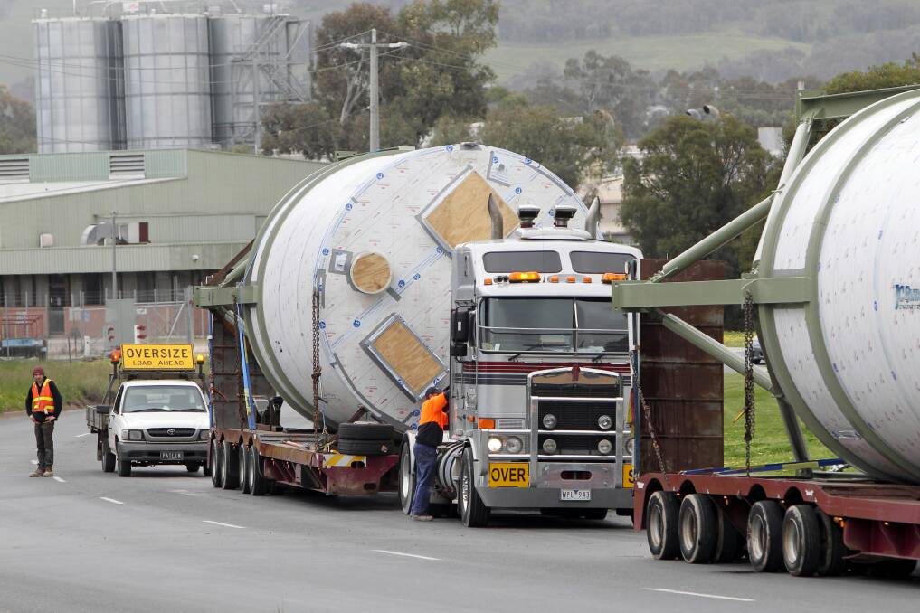 Trucking companies are being forced to wait up to 28 days for permits for oversized loads.