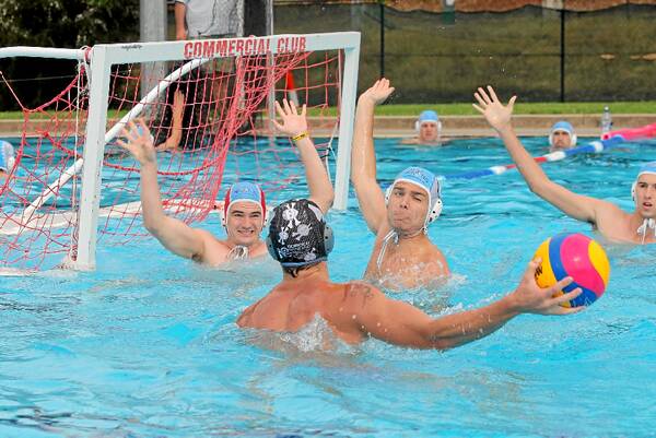 Peter Fenney lines up a goal for the Pool Pirates against Sharks goalie Jack Close. Picture: TARA GOONAN