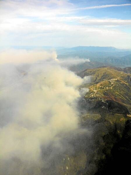 A view of the Hotham ridge line as the fire turns back on the village. Pictures: Seven news