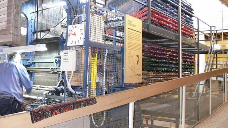 The carpet loom in action.