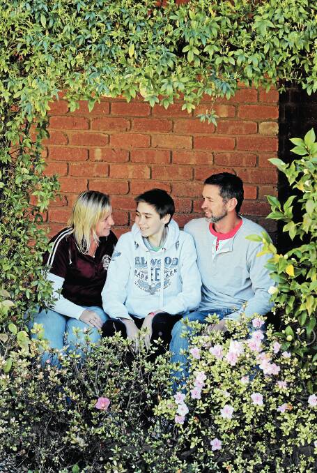 Louise, Ben and Peter Symons at home in Wodonga. Picture: DAVID THORPE