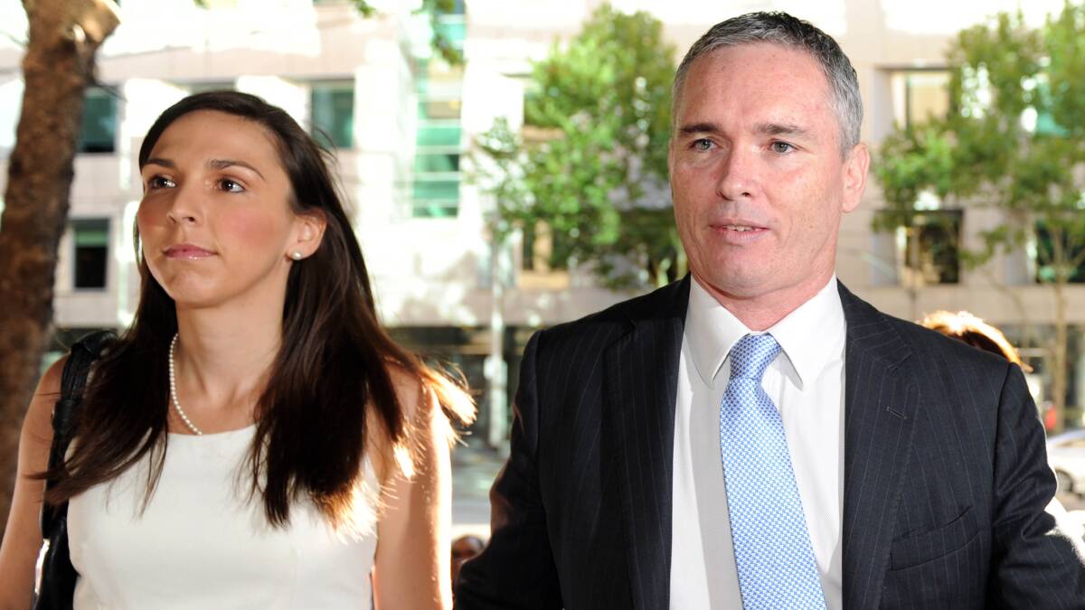 Craig Thomson, accompanied by his wife, arrives to face court in Melbourne. Photo: MAL FAIRCLOUGH