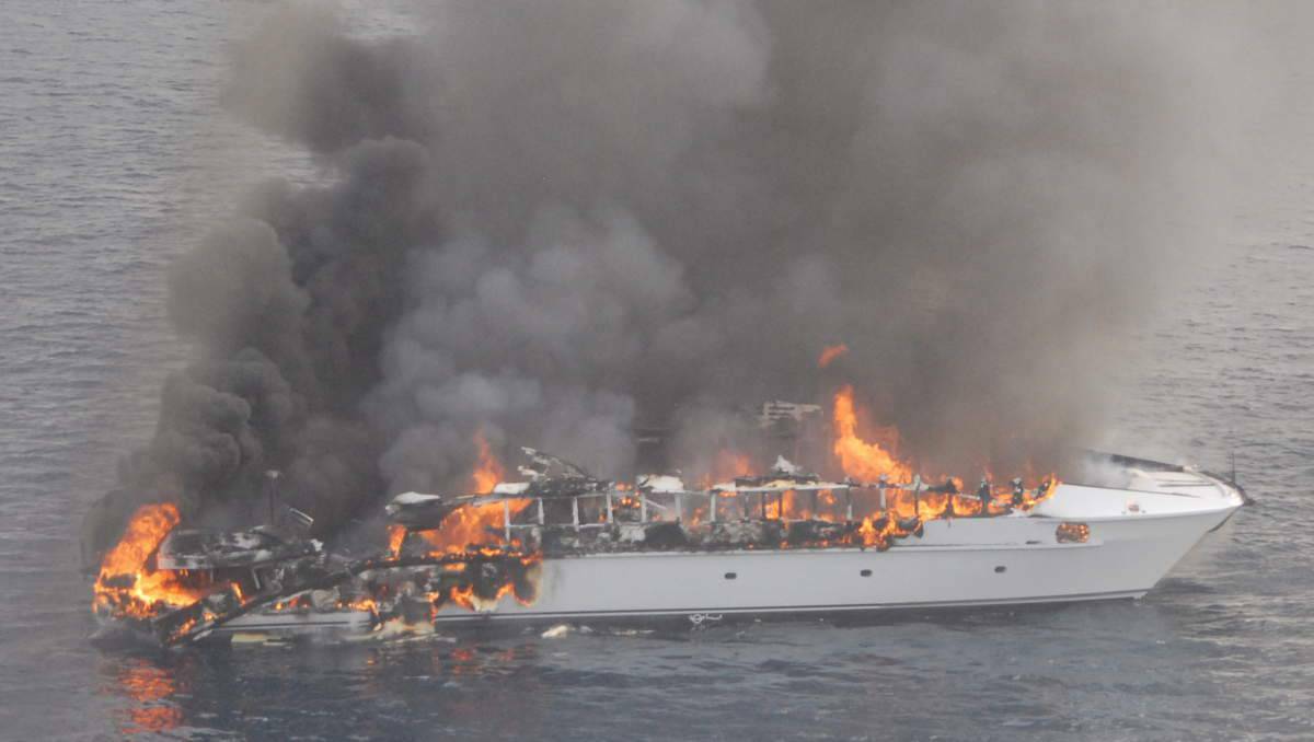 Seafaris on fire off Cairns on Thursday. Image supplied by Australian Maritime Safety Authority.