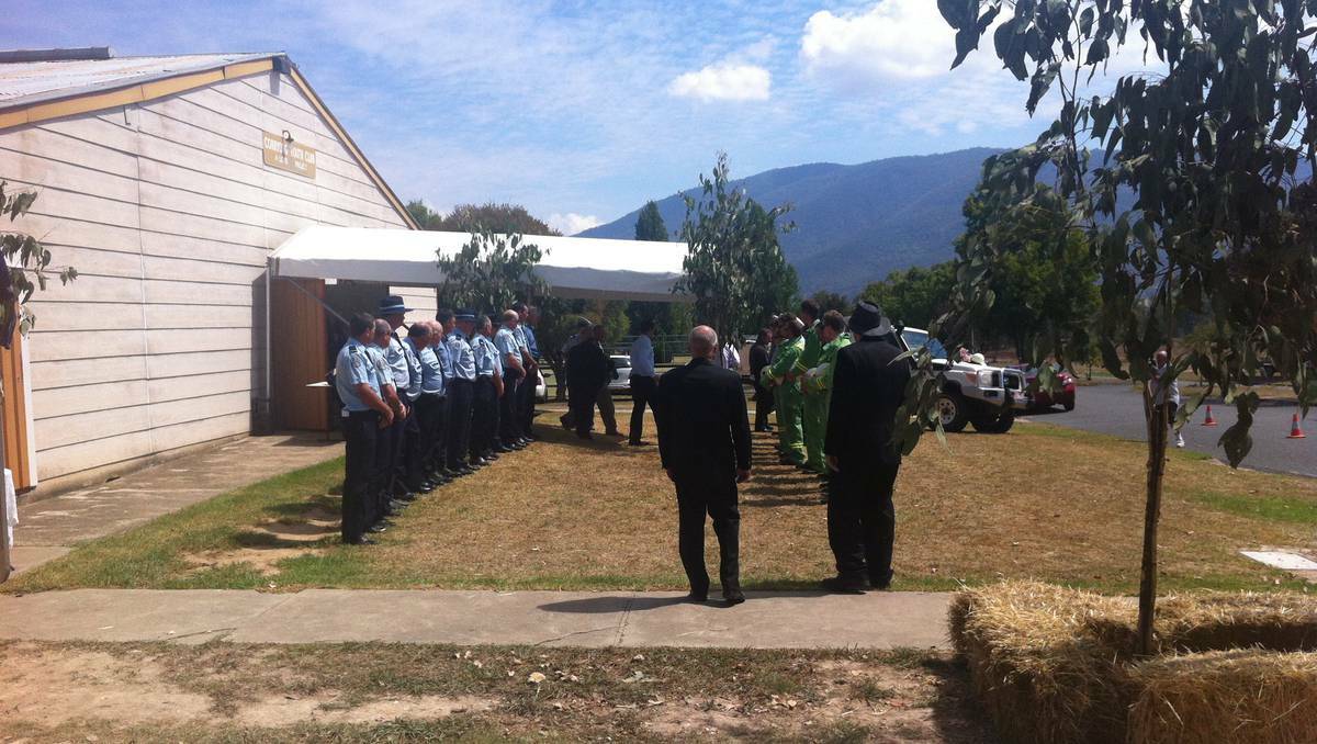 A guard of honour is formed by officials at Steven Katar's memorial. Photo: TAMMY MILLS.