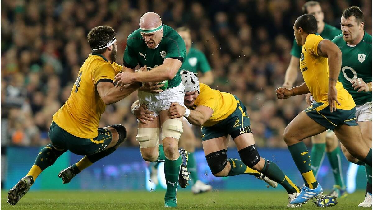 Ben Mowen of Australia tries to tackle Paul O'Connell of Ireland during the International match between Ireland and Australia. Photo: Getty Images.