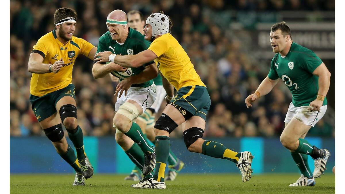 Ben Mowen of Australia tries to tackle Paul O'Connell of Ireland during the International match between Ireland and Australia. Photo: Getty Images.
