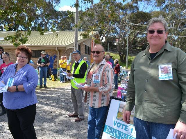 TEAM HASTIE: Team Hastie at the Narooma polling station were Pam Coulton, Paul Hume and candidate Brian Hastie. 