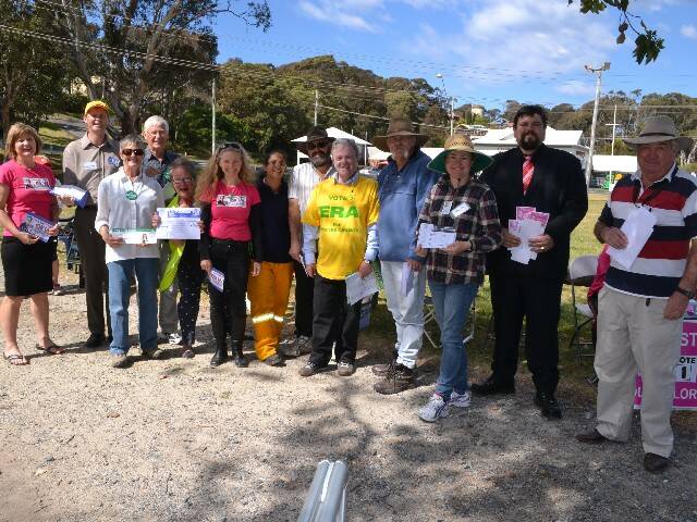 NAROOMA CREW: Handing out at the Narooma Sports and Leisure Centre polling station on Saturday morning are Catrina Hill for Orit Karney Winters, candidate Lindsay Brown, Anne Marett and Gerry Watt for the Greens, Maggie Havu for Fergus Thomson, Jackie Stallard for Orit Karney Winters, candidate Orit Karney Winters, Alan Millar for Dan Field, candidate Dan Field, Michelle Scobie for Graham Scobie, Steve Betteridge for Phil Constable and John Glover for Rob Pollock.   