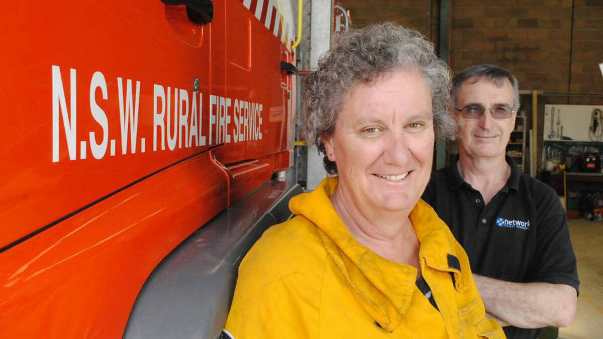 SOUTHERN HIGHLAND NEWS: THE people of Hill Top are doing their bit to thank the Rural Fire Service (RFS) which protected their village. Hill Top RFS senior deputy captain Michelle Coates and event organiser Seamus Byrne are looking forward to the Fundraiser for the RFS. Photo by Emma Biscoe.