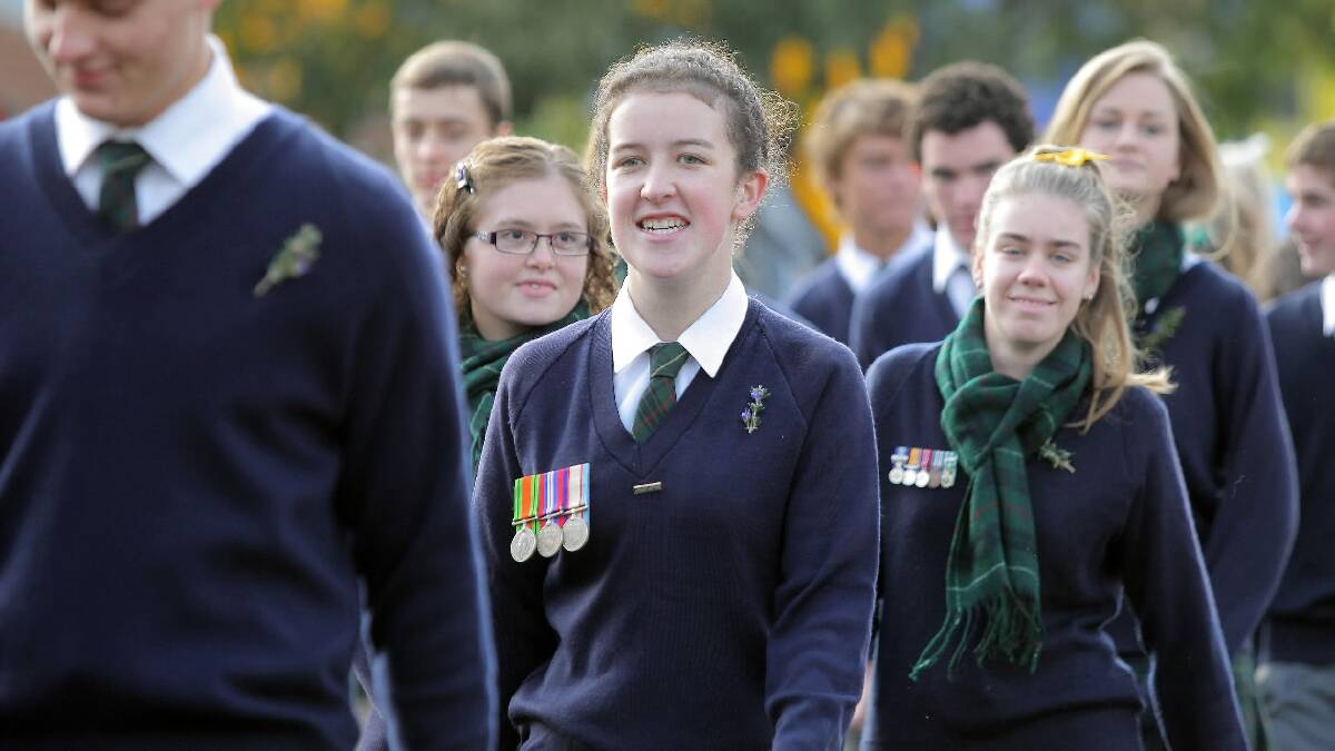 Xavier College's Eloise Hill, marching in last year's Anzac Day parade.