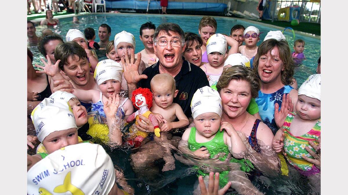Former Olympic swim coach Laurie Lawrence promoting 'Kids Alive Do The Five' program at the Seal Swim School Wodonga. Picture: SIMON GROVES