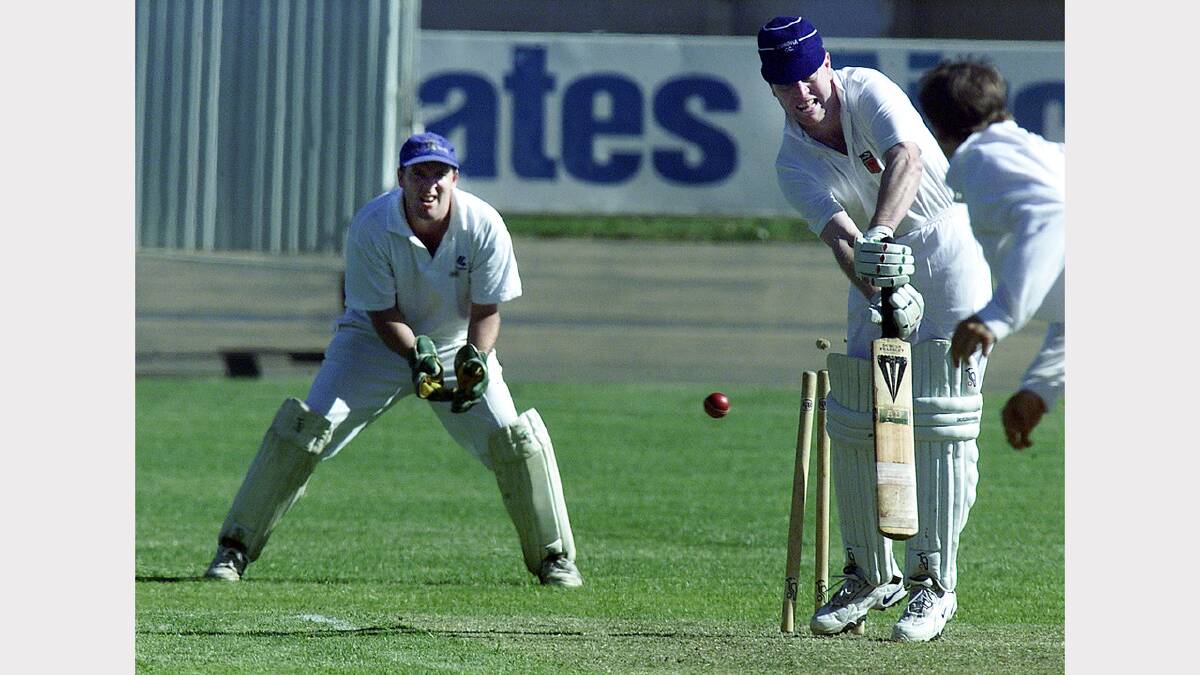 Wangaratta Magpies vs Corowa. Barry Grant looks on while Paul Miegel is bowled at at Norm Minns Oval. Picture: SIMON GROVES