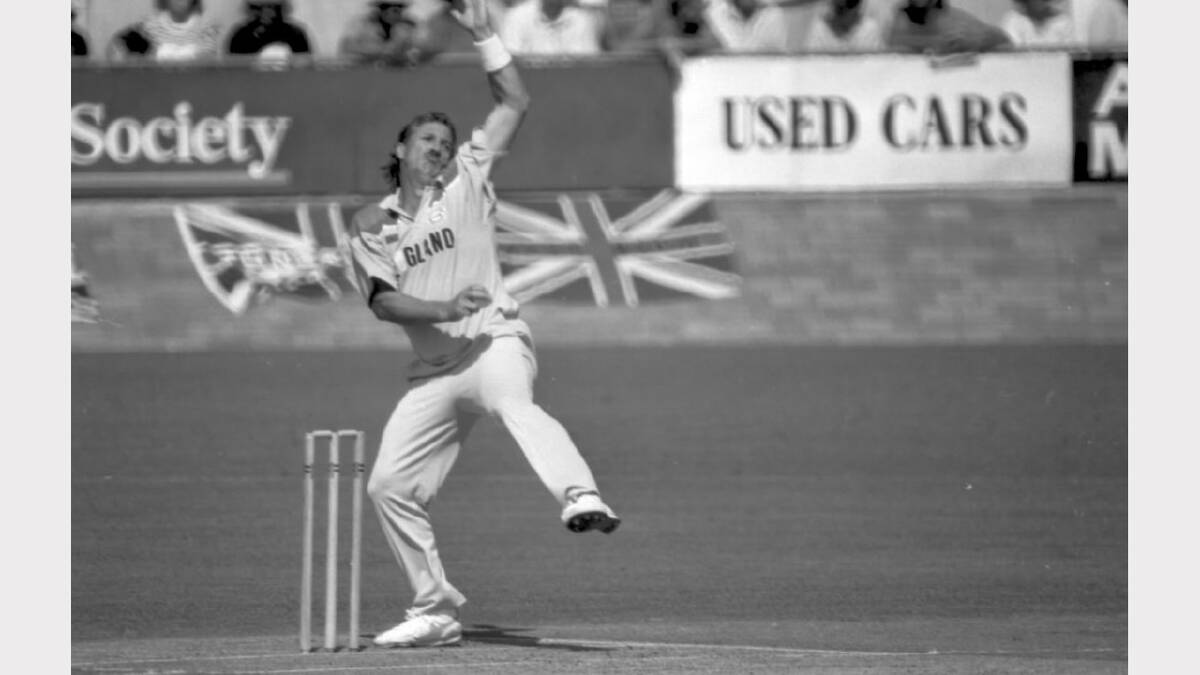 England all-rounder Ian Botham bowls during the nine-run defeat to Zimbabwe at the Lavington Sports Oval. Botham took 3-23 and made 18 runs as England was bowled out for just 125, chasing 134 to win.