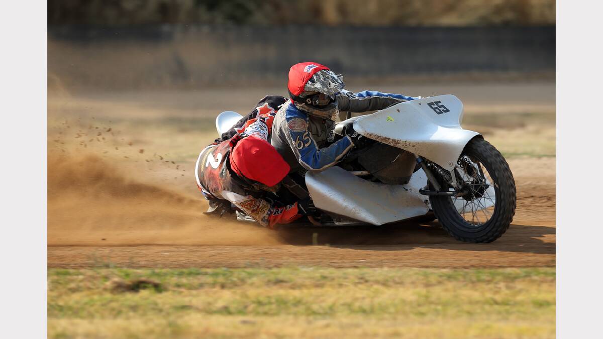 Rob Patterson and Brenton Kerr lead the race in heat 14 of the Sidecar Grand Slam Series at the Lincoln Causeway on Saturday.
