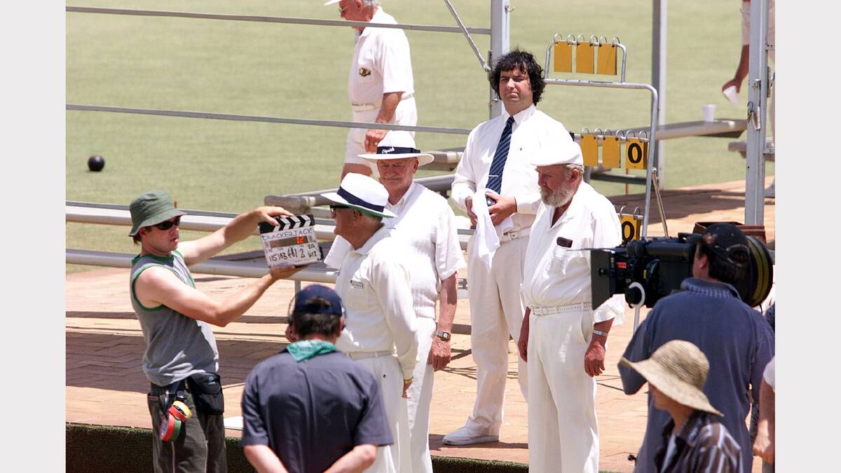 Filming of movie "Crackerjack" at Corowa Bowls Club - Mick Molloy at back with Bill Hunter beside him. Picture: CHRIS McCORMACK