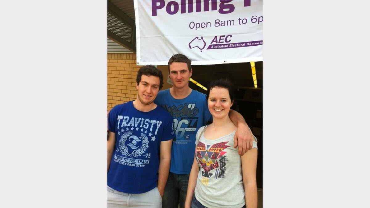 2.30PM: Marc Sortino, of Numurkah, Rhyan Matera, of Canberra, and Lexi Lawrence, of Mt Annan, vote at Howlong Public School.