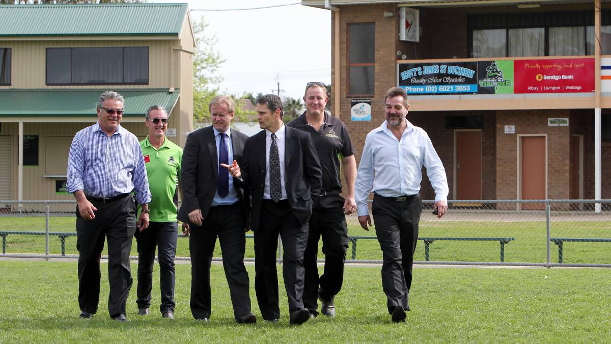 CEO of Country Rugby League Terry Quinn, Albury Thunder's Mike Eden, CEO of NRL Dave Smith, Australian Rugby League Commissioner Wayne Pearce, Albury Thunder coach Josh Cale and Country Rugby League operations manager Bert Lowrie inspect the facilities at Greenfield Park yesterday. Picture: MARK JESSER