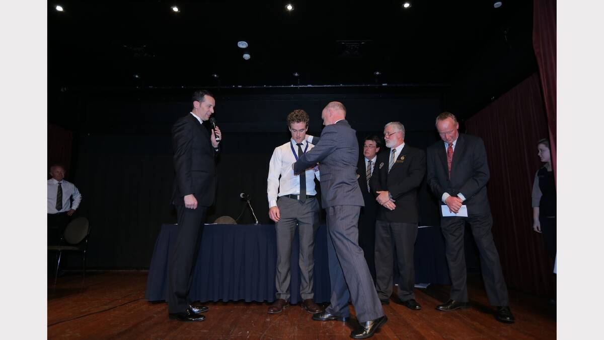 Xavier Leslie is presented with his Morris Medal.