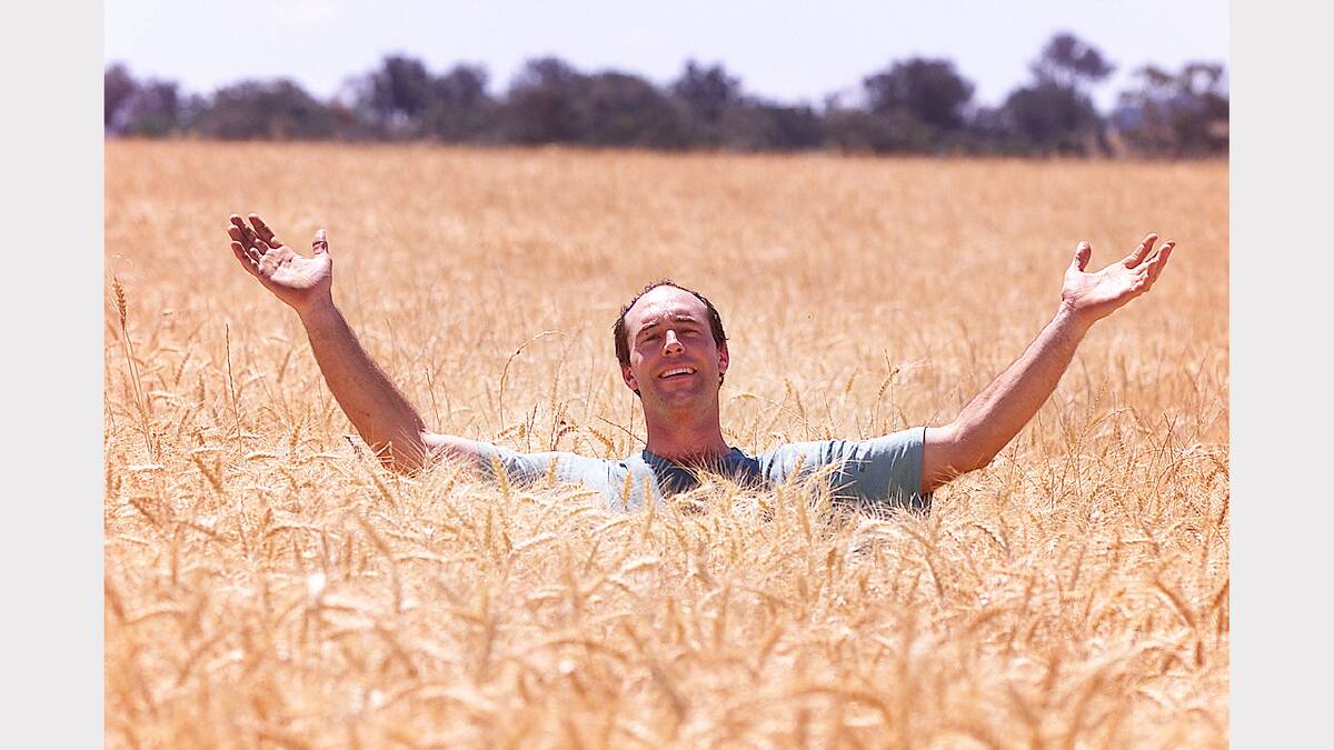 Martin Salzke at 'Willow Park' in his wheat crop. Picture: SIMON DALLINGER