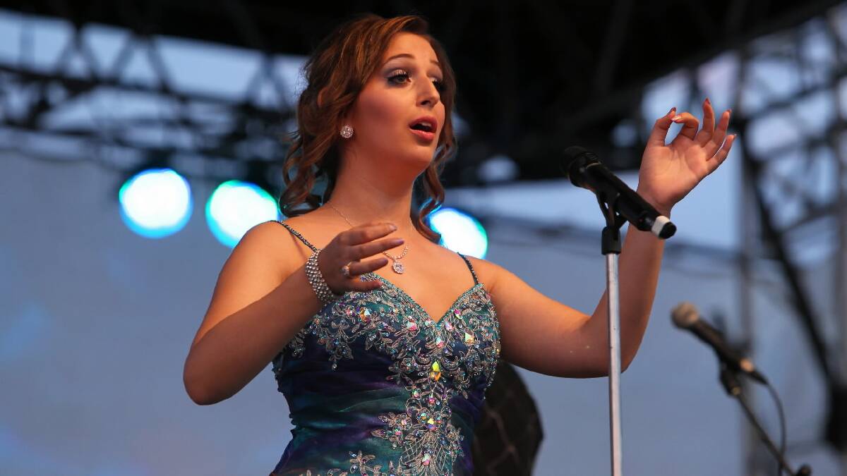 Jessica Boyd, finalist with Opera Scholars Australia, singing on stage at Opera in the Alps.