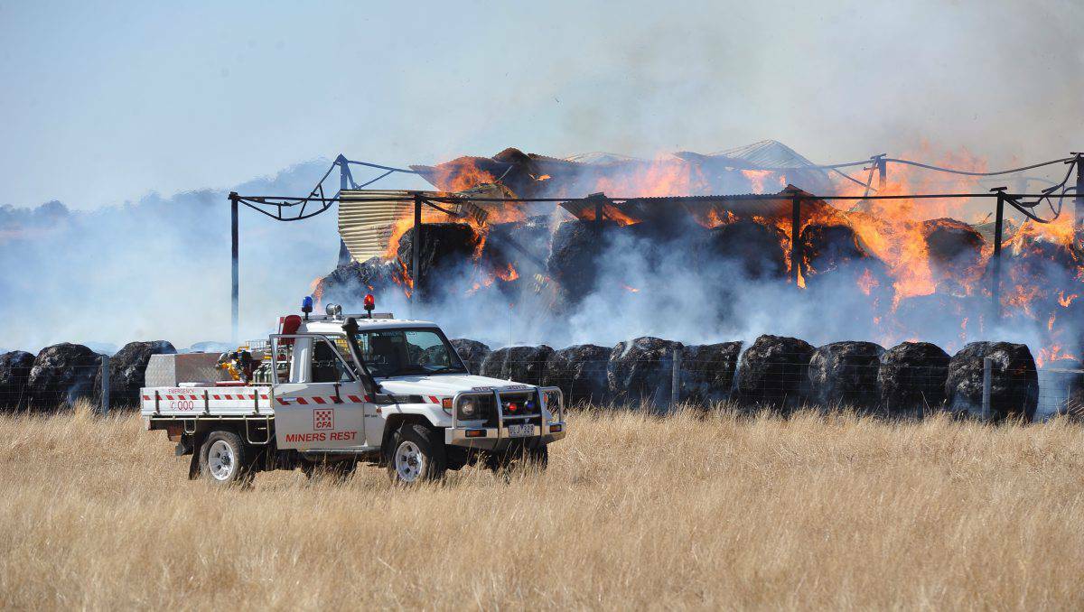 Hay bales burn in this Learmonth fire. Pic: LACHLAN BENCE, The Courier.