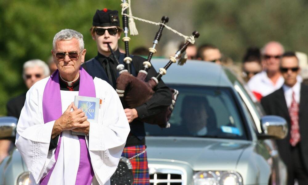 Click or flick across for full gallery of photos from the burial service.
