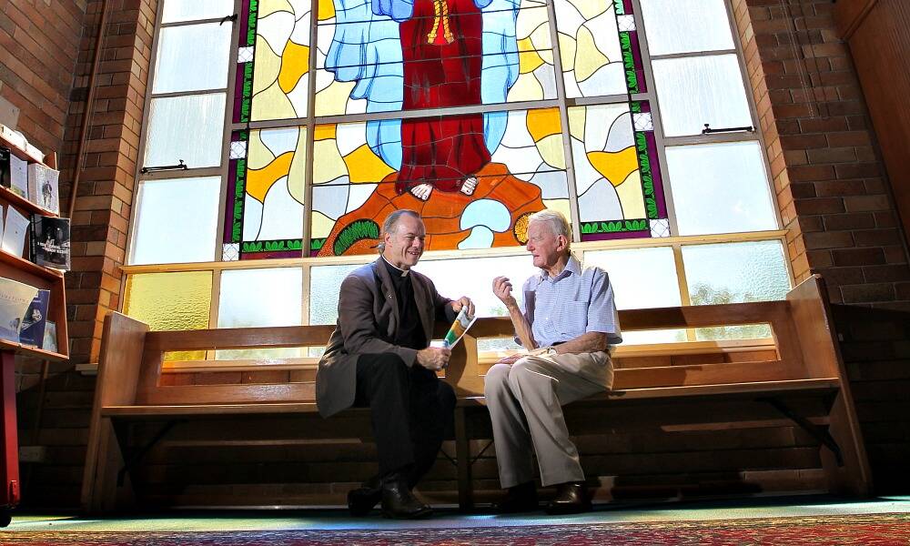Father Peter MacLeod Miller and Father Kevin Flanagan share their views on the recent break-ins and thefts from the Albury Church of God at the Scared Heart Catholic Church.  Picture: DAVID THORPE