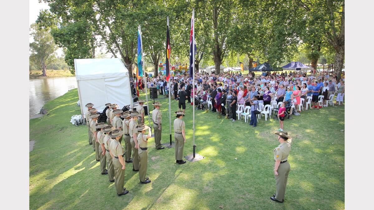 Noreuil Park, Australia Day Ceremony 2013, the flags being raised at the start of the ceremony, with the large crowd in attendance. PICTURE: Tara Goonan.
