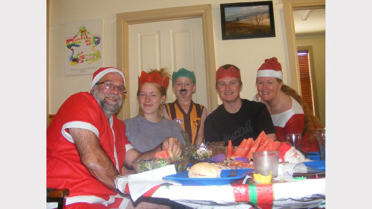 Posted on our Facebook page by Merryn White, of Tallangatta: "this is my family having lunch from L to R Tony, Lucy, Nathan, Zac and Merryn White. We decided to get in the mood of the day and dressed as Santa and Mrs Santa"