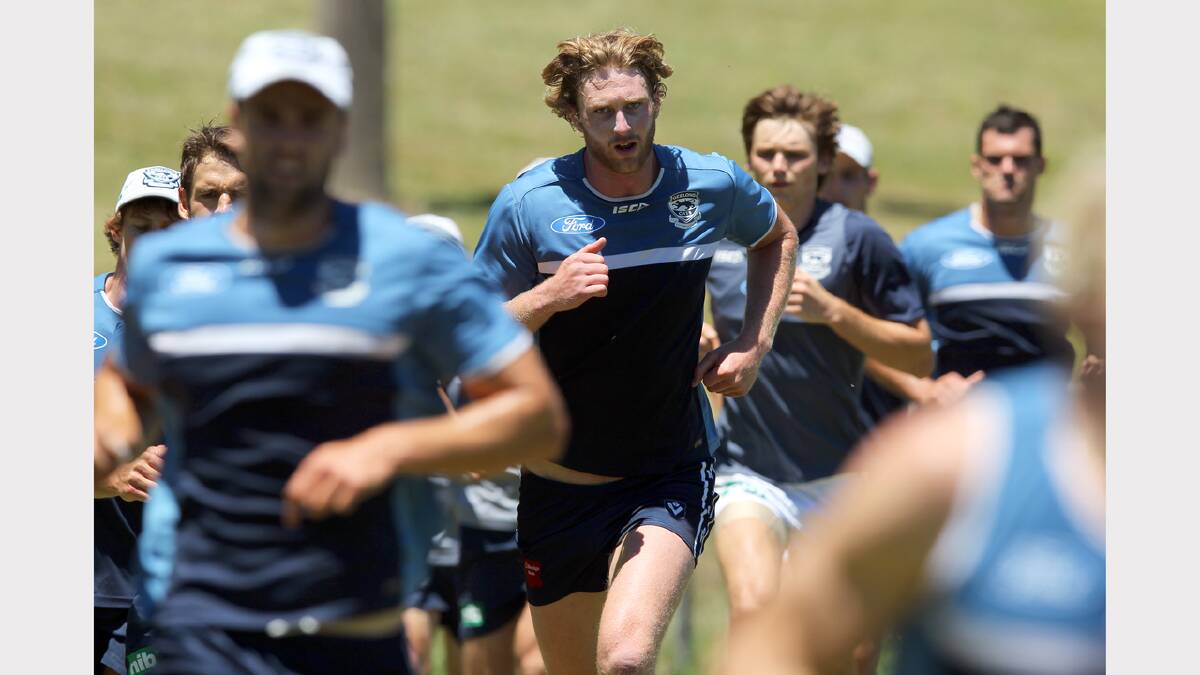 Geelong Football Club trains at the Mt Beauty football ground for the AFL pre-season. Dawson Simpson puts in the hard yards.