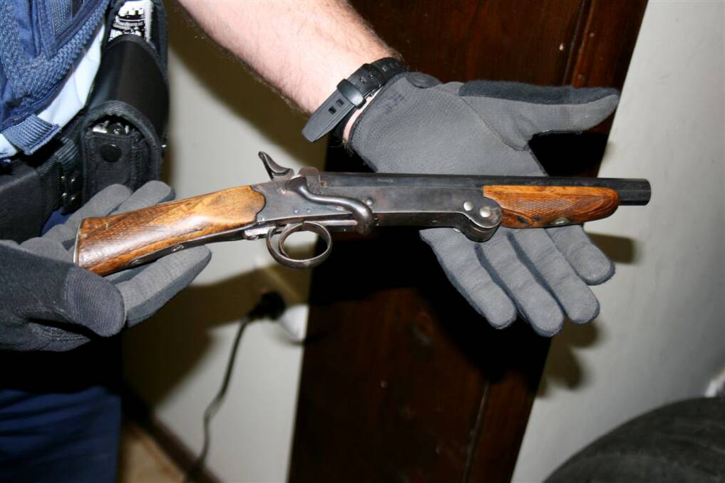 Some of the firearms found by police during a raid on a house in which a hydroponic set-up for growing drugs was also found.