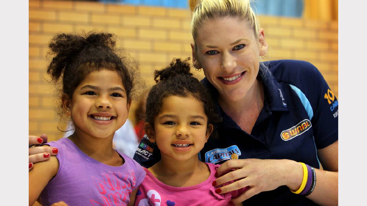 Aleira, 5, and Kijana McCowan, 4, daughters of the late Allen McCowan, pictured with Lauren Jackson in the Lauren Jackson Sports Centre. PICTURE: Matthew Smithwick.
