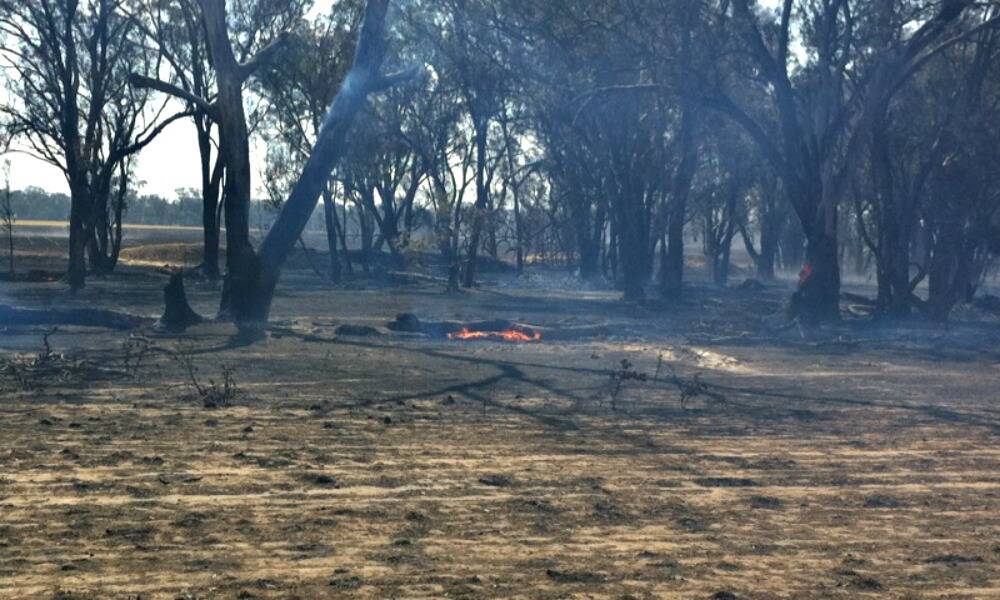 The smouldering remains of the Munyabla fire.