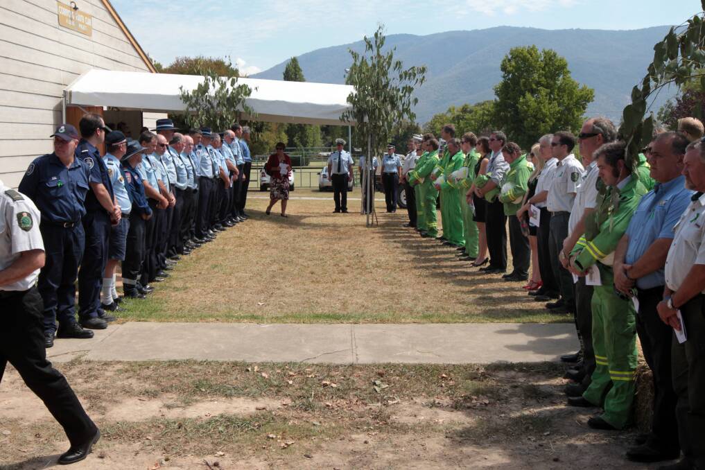 Emergency service personnel form a guard of honour at a memorial service for Steven Kadar. Picture: PETER MERKESTEYN