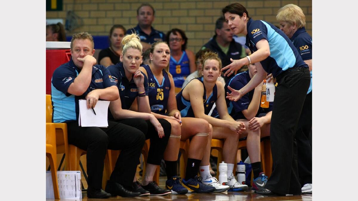The Canberra bench looks on during the WNBL match between Canberra Capitals and Bendigo Spirit at the Lauren Jackson Sports Centre. PICTURE: Matthew Smithwick.