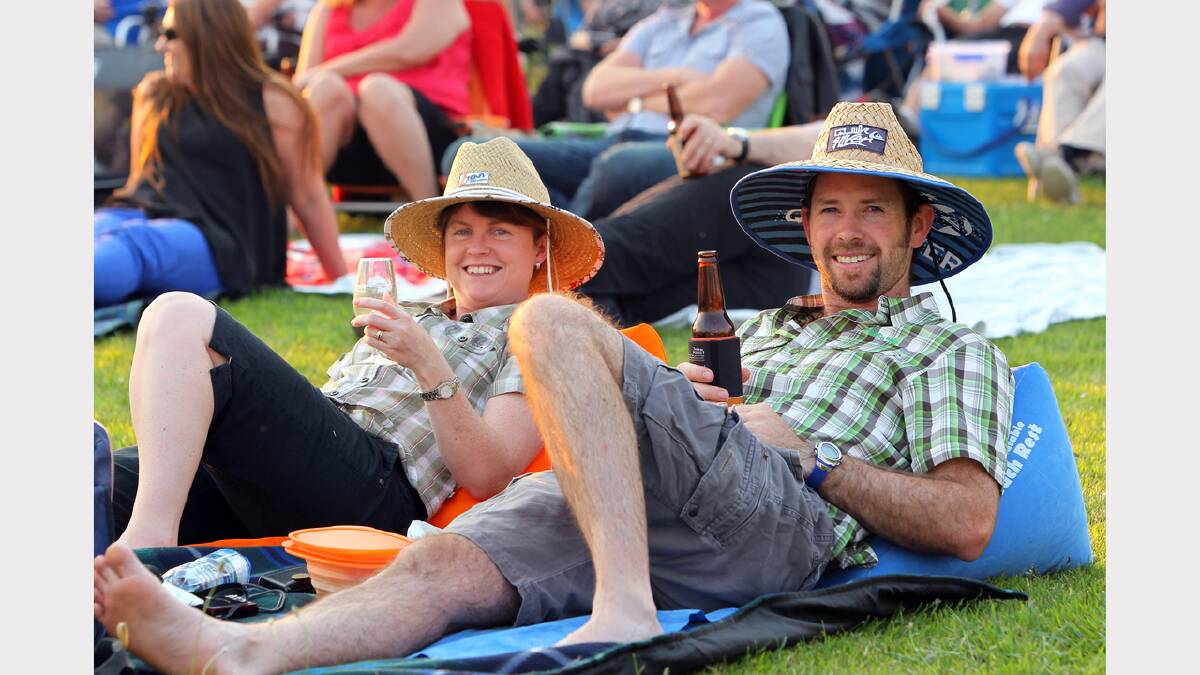 Maree and David Harper, of Lavington, relax on the grass for the show.