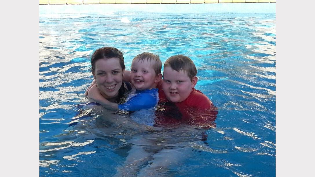 Cousins Tori Colls, Jordan Delaney and Kaleb Delaney cool off in the pool on a hot Australia Day. Picture Kylie Delaney
