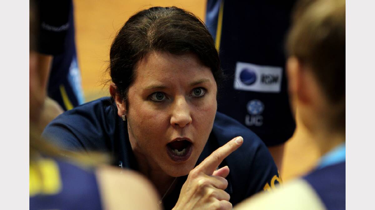 Canberra coach Sandy Tomley speaks to her players during a break in the WNBL match between Canberra Capitals and Bendigo Spirit at the Lauren Jackson Sports Centre. PICTURE: Matthew Smithwick.